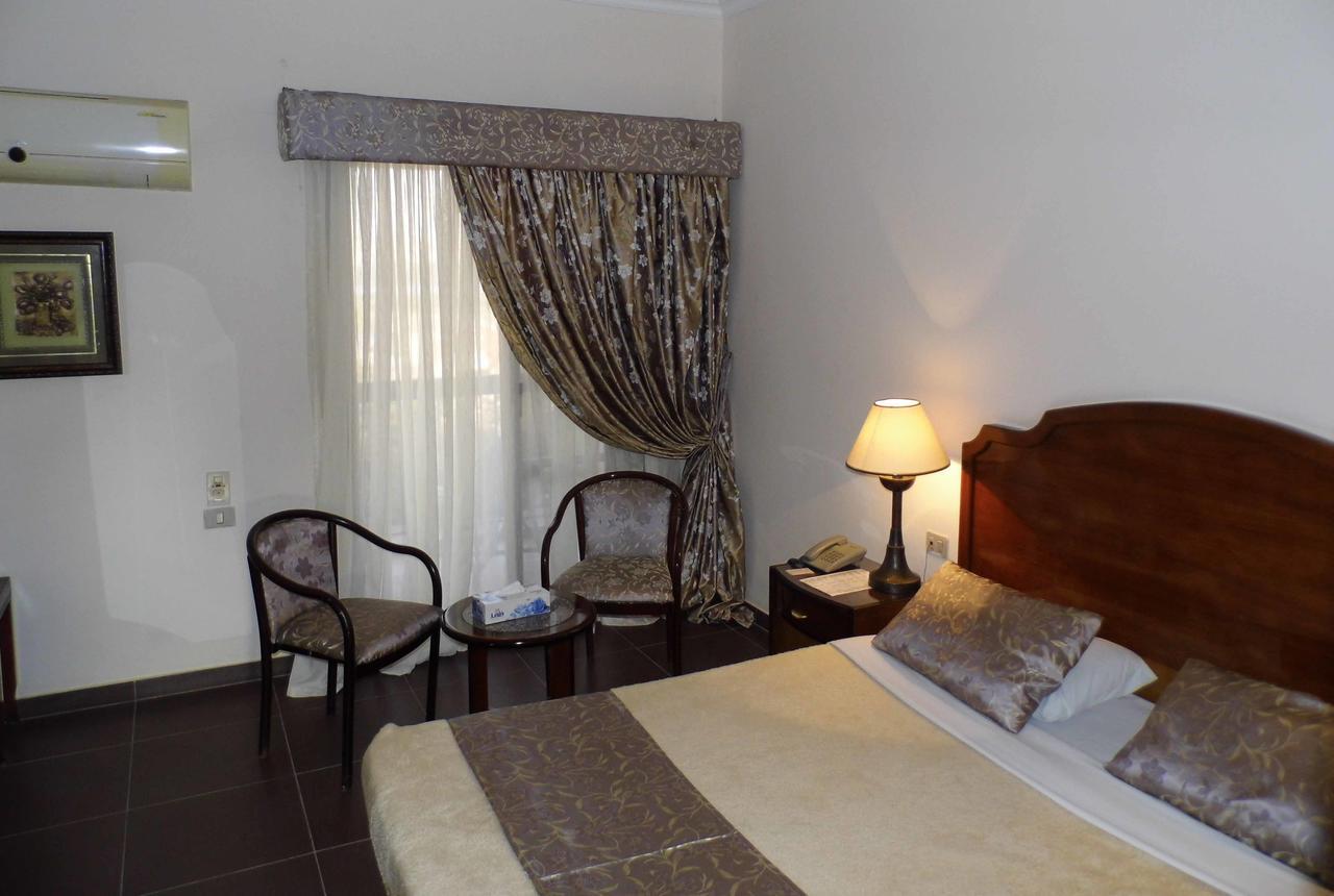Mg Nefertiti Hotel Al-Minya Zimmer foto