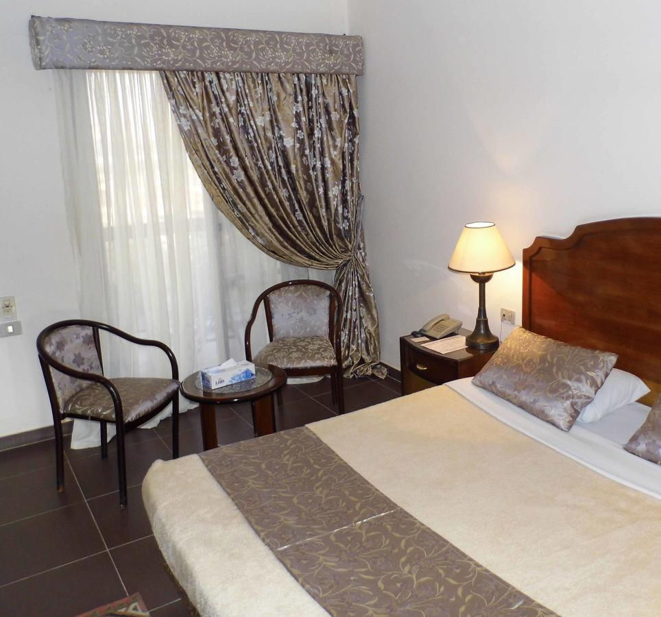 Mg Nefertiti Hotel Al-Minya Zimmer foto